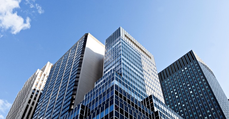 A view of a building that has multiple levels and facets.